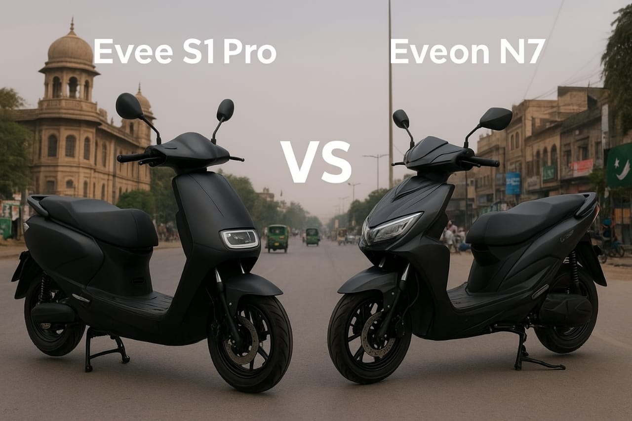 Comparison of two black electric scooties, Evee S1 Pro on the left and Eveon N7 on the right, parked on a city street in Pakistan.