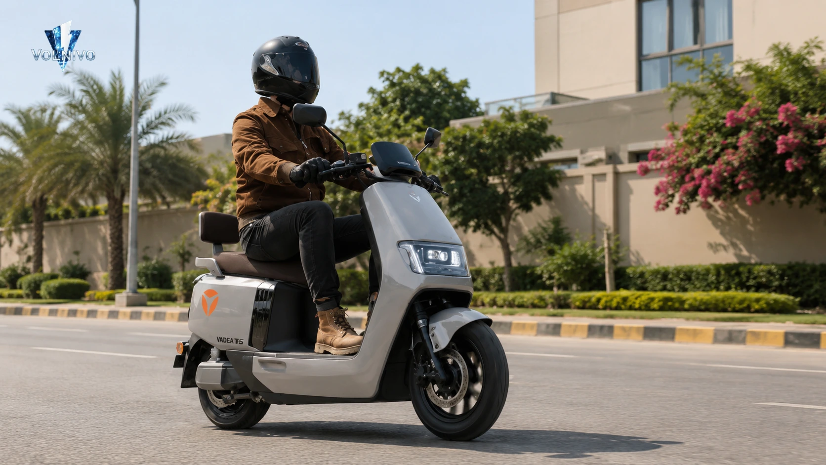Commuter wearing helmet riding grey e-scooter: Electric Scooters Safe in Pakistan.
